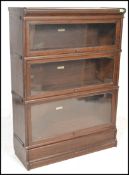 An Edwardian / early 20th century oak Globe Wernicke stacking lawyers bookcase cabinet in three