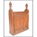 A 19th Century Victorian gothic oak ecclesiastical church prayer desk, three panels to the front