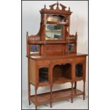 A 19th Century Victorian mahogany mirror back sideboard. The base raised on turned legs with a