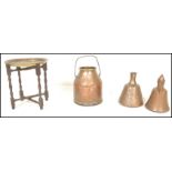 A 19th Century copper milk churn together with two Persian style hand worked coffee pots and a