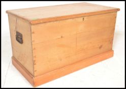 A 19th Century Victorian pine blanket box chest, hinged top with open storage, carry handles to