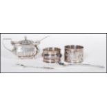 A selection of silver items, most having English hallmarks to include a mustard pot condiment having