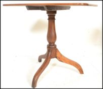 A 19th Century Victorian mahogany pedestal tilt top wine / occasional table, the rectangular top