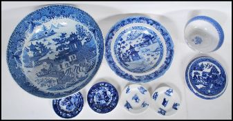 A group of 19th Century blue and white English china wares to include a large willow pattern