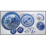 A group of 19th Century blue and white English china wares to include a large willow pattern