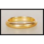 A hallmarked 22ct gold wedding band ring. Hallmarked Birmingham 1934. Weight 4.1g. Size J.