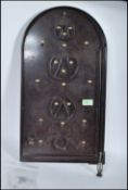 An early 20th Century English made 1930's /1940's brown bakelite board with a quantity of steel ball