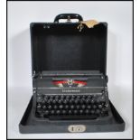 A vintage early 20th Century circa 1930's Underwood universal portable reporters typewriter, in