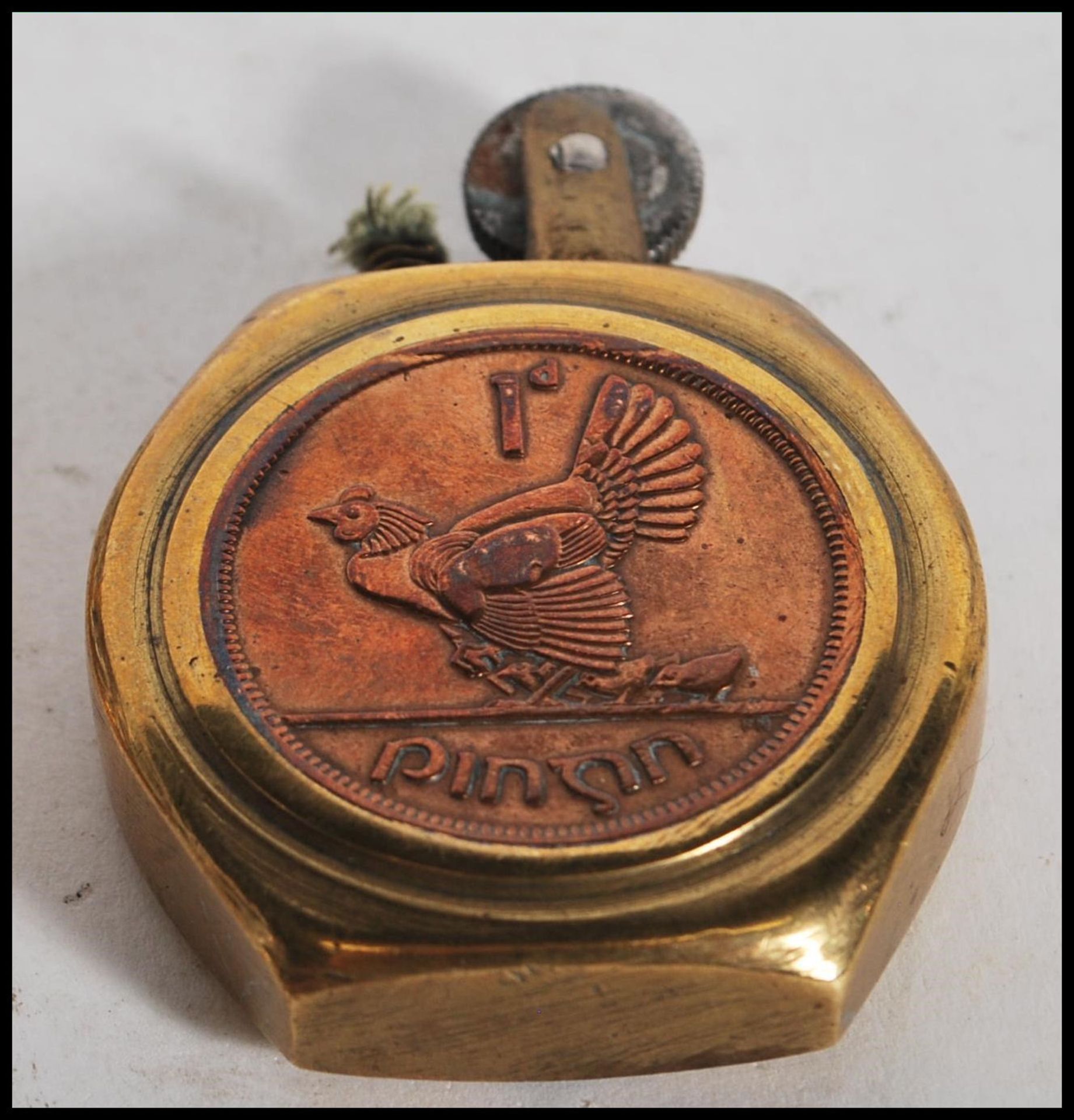 Two 20th Century military WW2 trench art brass lighters of round form one inset with a British coin, - Bild 4 aus 5