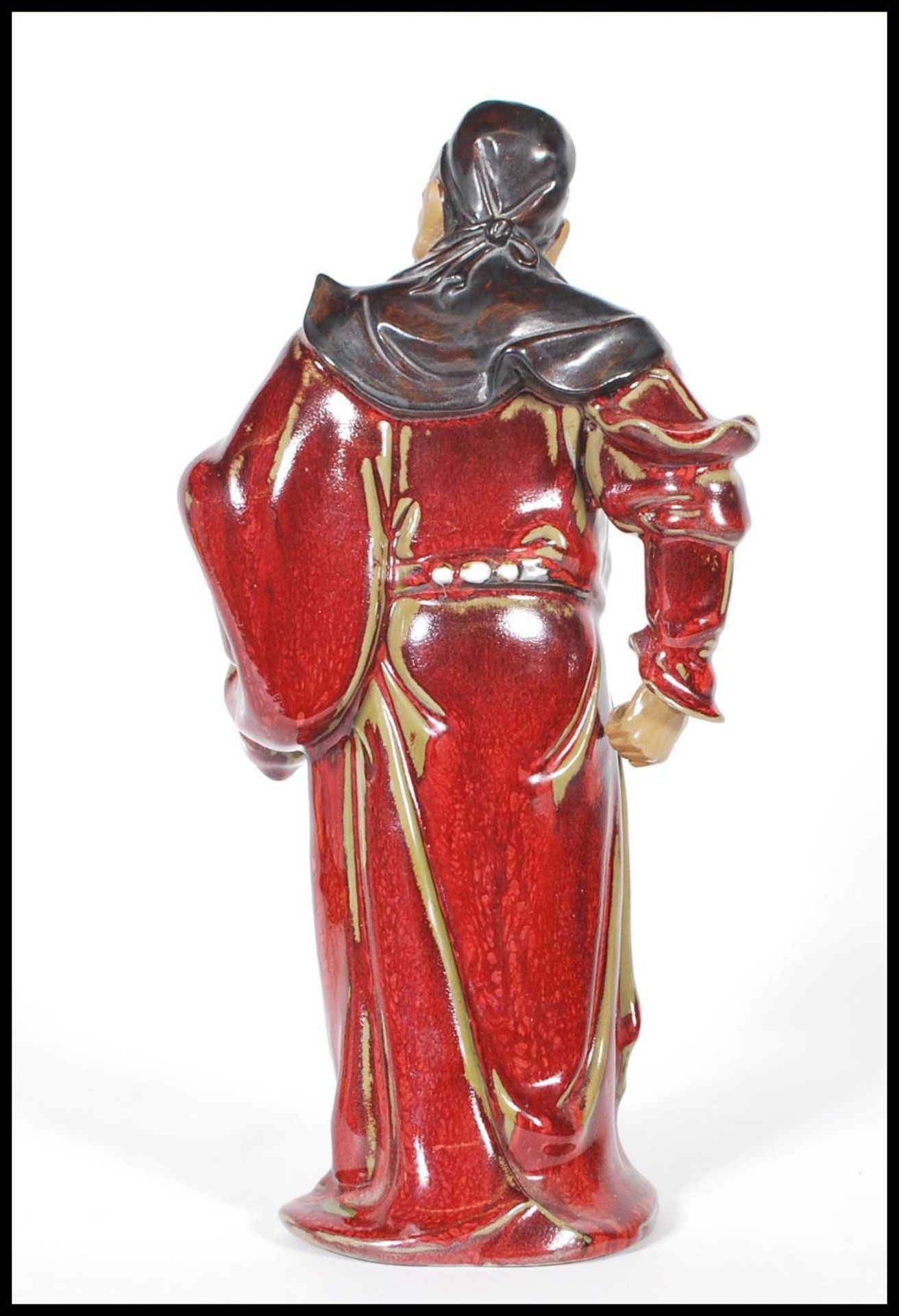 A stoneware figure of Chinese warrior decorated with sang de boeuf glaze with light green - Bild 3 aus 6