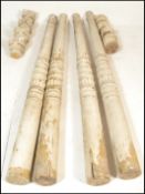 A set of four tall 19th Century architectural corinthian column pillars of neo classical form,