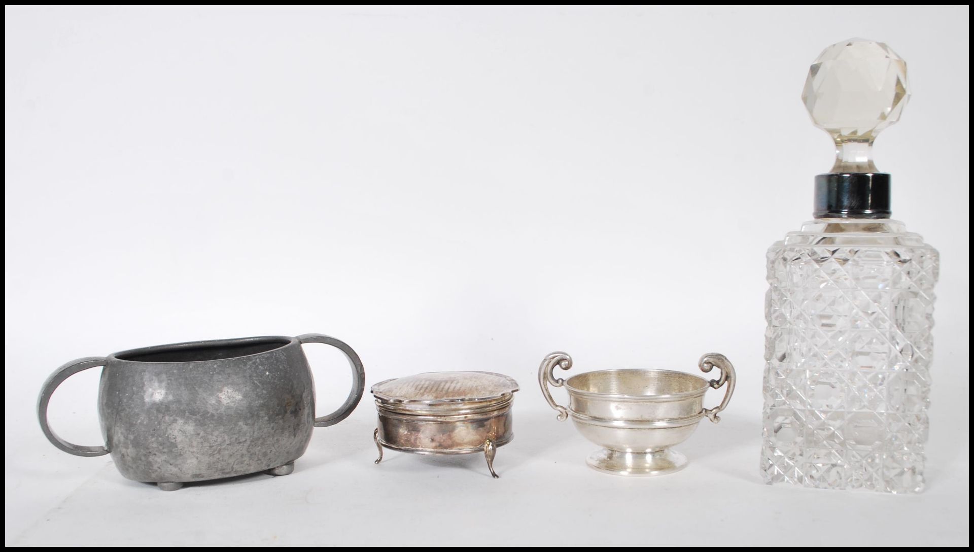 A selection of silver items to include a twin hand