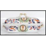 A 19th Century Victorian Spode tureen having hand painted Imari decoration to the sides bearing