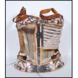 A 19th / 18th Century antique medical correctional back brace corset, possibly for scoliosis,