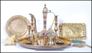 A collection of 20th Century brass items to include a Persian engraved teapot, an Indian engraved