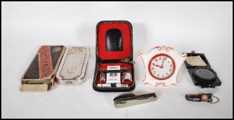 A collection of vintage 20th Century items to include a gents leather cased travel grooming set with