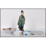 A collection of Chinese ceramics to include a Ming dynasty style earthenware tomb attendant