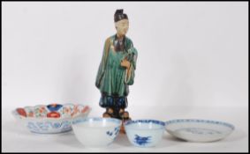 A collection of Chinese ceramics to include a Ming dynasty style earthenware tomb attendant