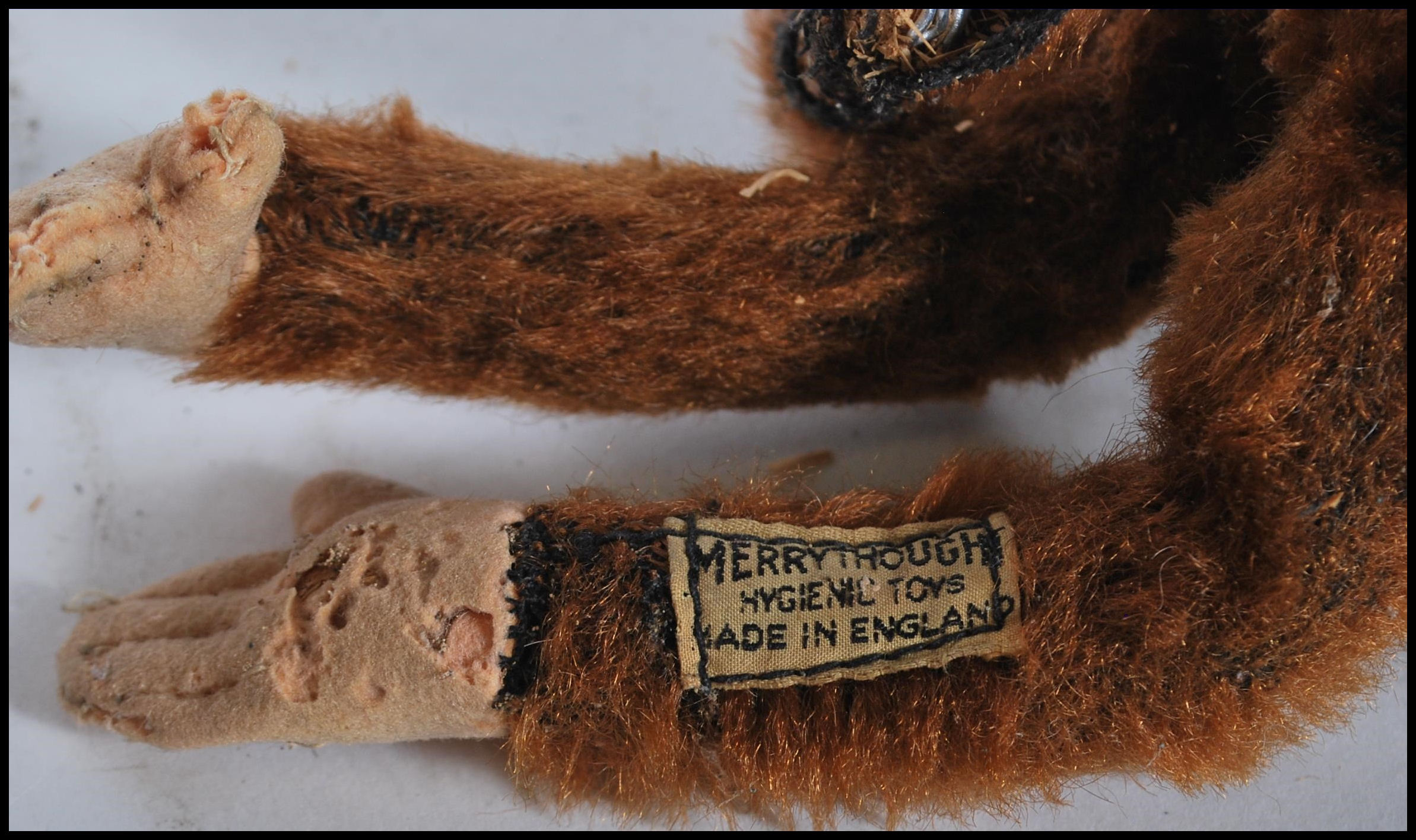 A vintage 1950's Merrythought made soft toy straw filled monkey with bead eyes and original label - Image 5 of 5
