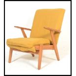 A retro vintage 1960's Parker Knoll 737 elbow armchair. Produced for the French market in the