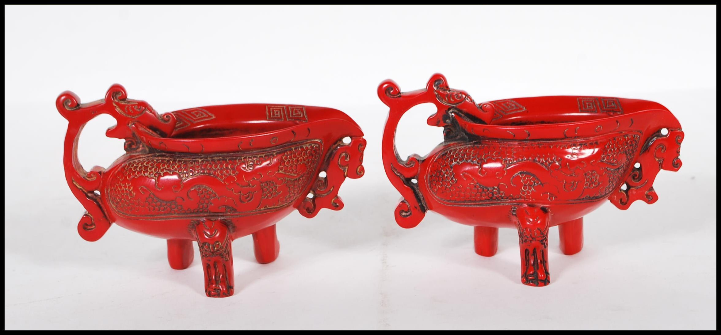 A pair of 20th Century Chinese faux Cinnabar lacquer oil pourers having scrolled decoration with - Image 3 of 6