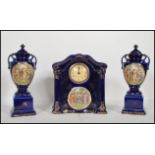 A early 20th Century English ceramic clock and garniture set by Empire ware. The central dial