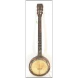 A 19th Century six string zither banjo having a central drum with marked fret board. AF.