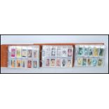 A collection of full sets of Brooke Bond Tea trade cards and give aways collectors cards over