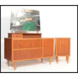 A retro 20th Century teak wood dressing table and