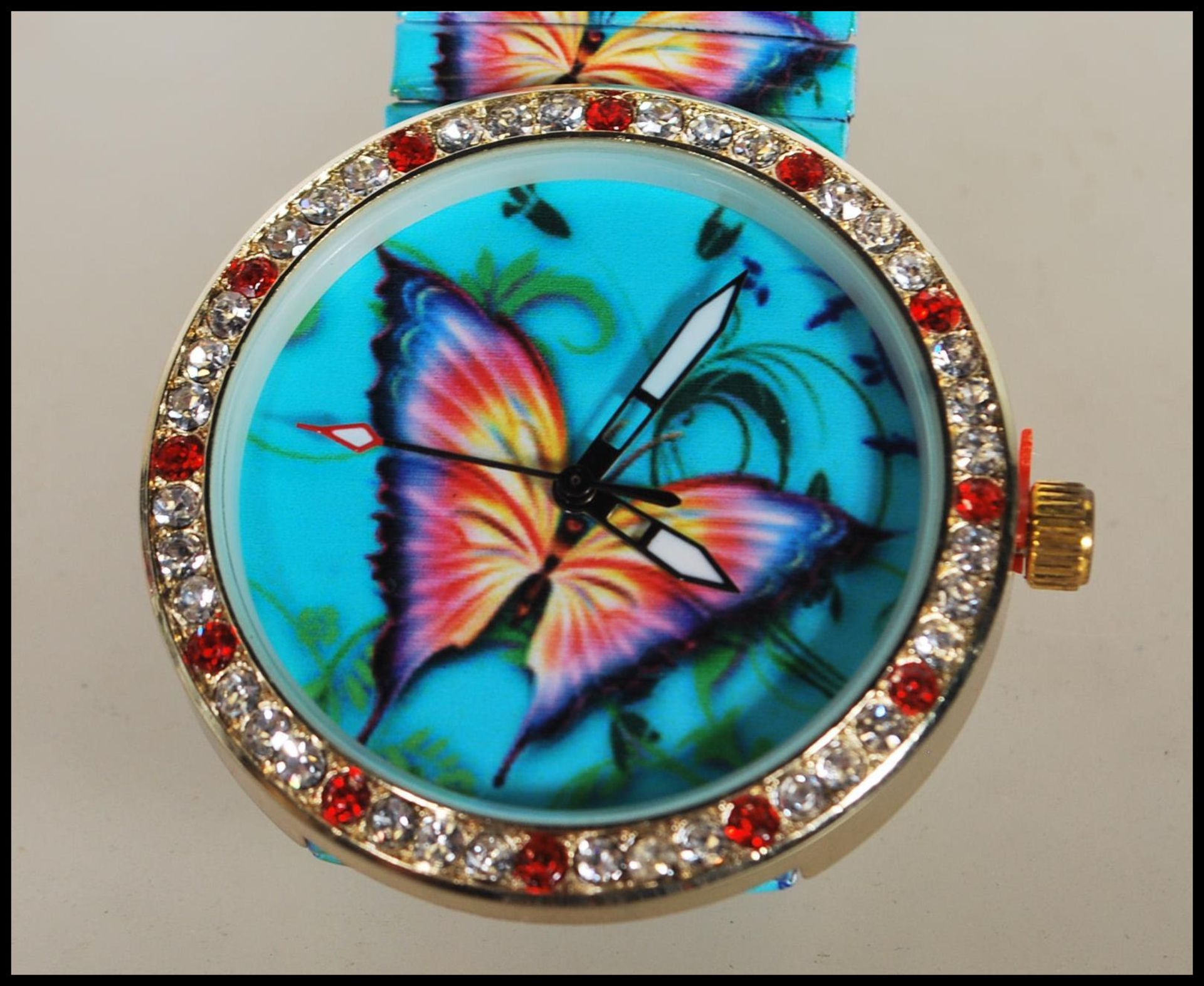 A ladies wrist watch having butterfly decoration to the face and expanding watch bracelet with the - Bild 2 aus 4