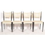 A set of for mid 20th Century Ernst Gomme for G-Plan dining chairs in the manner of Gio Ponti. The