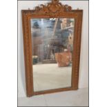 A 19th Century gilt gesso frame wall mirror having moulded gadrooned detailing to the frame with a