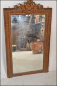 A 19th Century gilt gesso frame wall mirror having moulded gadrooned detailing to the frame with a