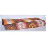 Interior design- A retro mid 20th Century roll of fabric in orange and brown colour with various