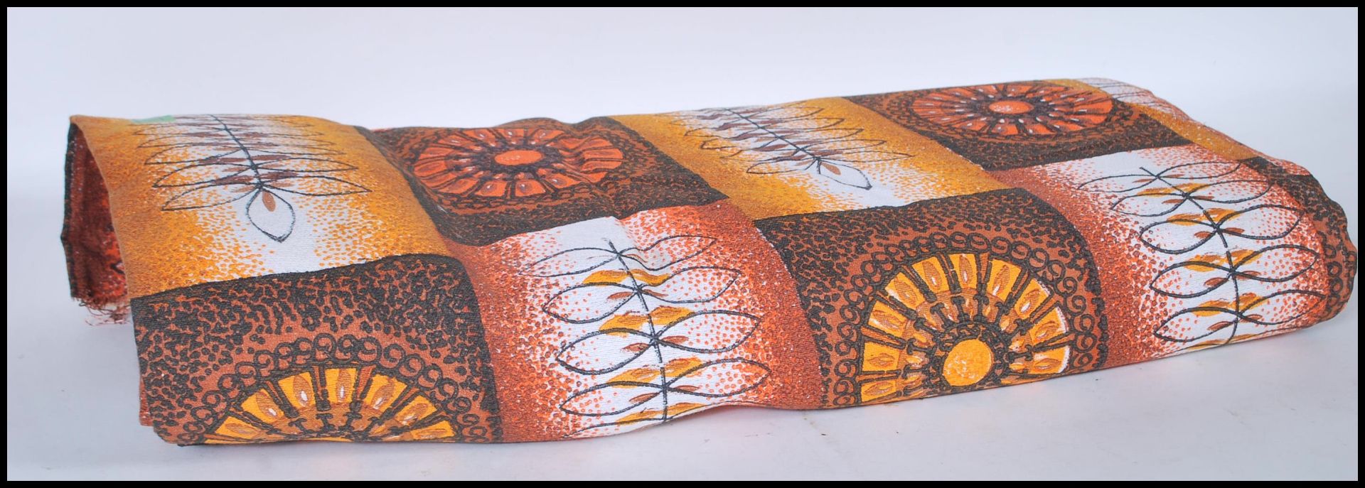 Interior design- A retro mid 20th Century roll of fabric in orange and brown colour with various