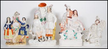A group of large 19th Century Victorian Staffordshire flat backs to include ' Robin Hood ' featuring