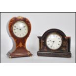 A early 20th Century Edwardian mahogany cased balloon clock having inlaid decorative border with