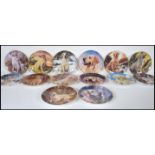 A collection of twelve Golden Retriever Danbury Mint collector plates, the complete set of twelve