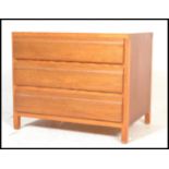 A 20th Century retro Danish light teak wood blind front chest of drawers, three straight drawers
