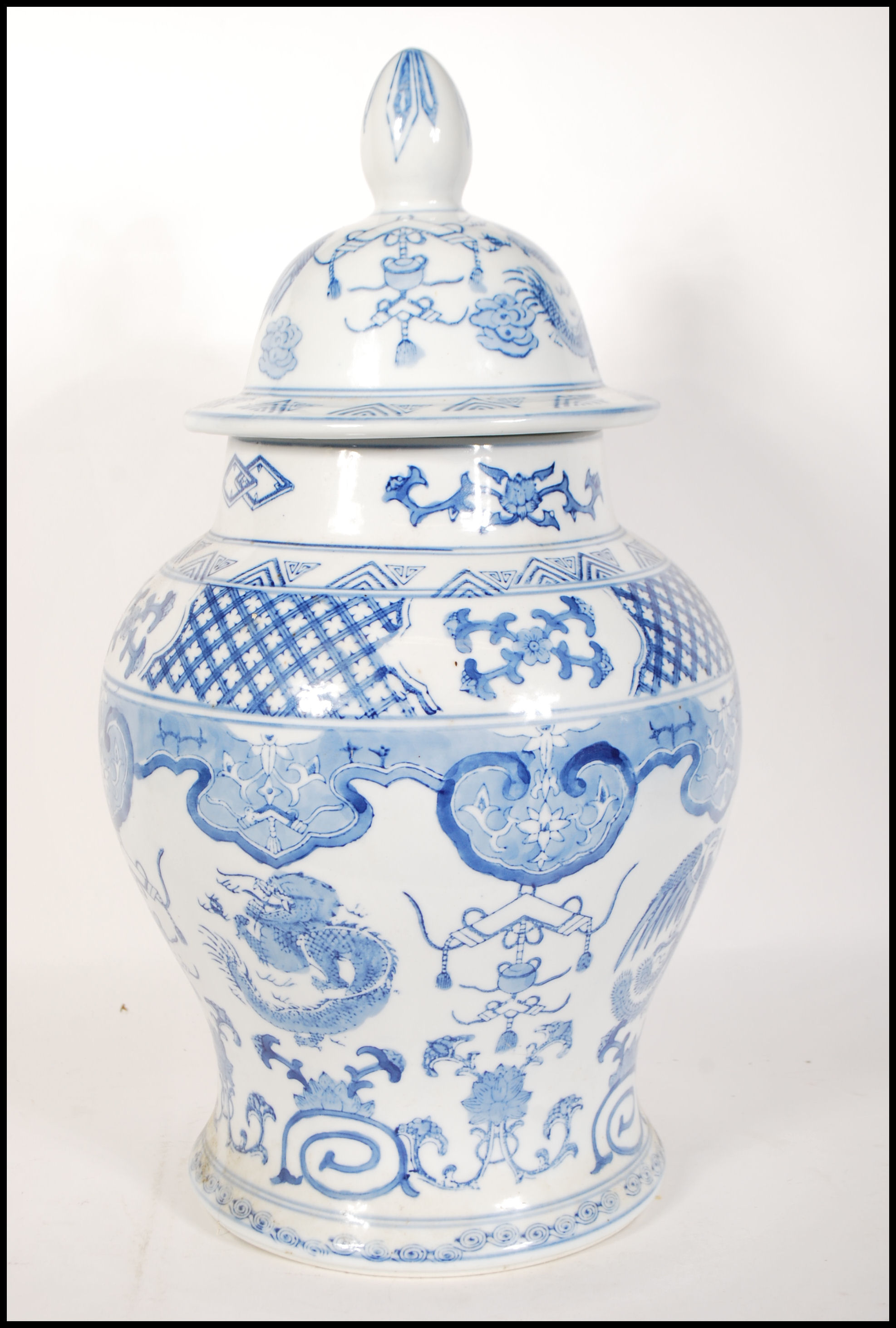 A tall 20th Century Chinese blue and white lidded - Image 3 of 9