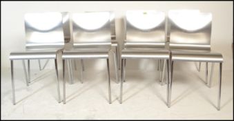A set of eight panel stacking dining  chairs, the