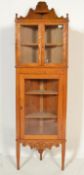 A 20th century Chestnut corner display cabinet, th