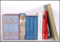 A collection of books to include a group of Folio