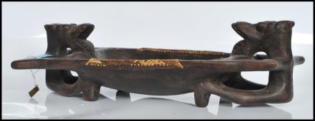 A 20th Century carved African hardwood tribal tray