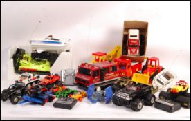 ASSORTED PLASTIC VEHICLES AND RC RADIO CONTROLLED