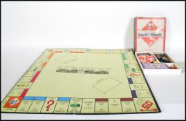 A vintage early 20th Century wartime Monopoly set