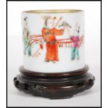 A 19th Century Chinese ceramic cup being hand deco