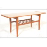 A mid century Danish influence faux teak wood long