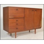 A mid century teak wood Avalon sideboard. Raised o