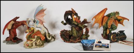 A collection of Enchantica dragon figures to inclu